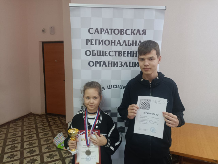 Участие воспитанников Центра "Точка роста" в открытых областных новогодне-рождественских соревнованиях по русским шашкам.